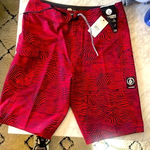 VOLCOM swim trunks. 28 waist (size 16). 4 way stretch,&cinch fly. BRAND NEW TAGS